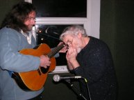 Roger tries to teach Dave's guitar the next tune!